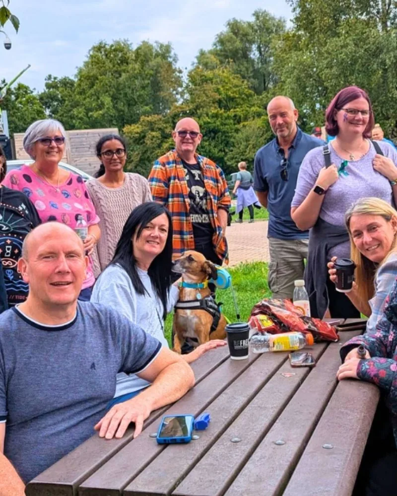 People gathered outdoors as part of the Recovery Cymru community.
