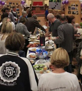 People gathered at a Recovery Cymru community celebration.