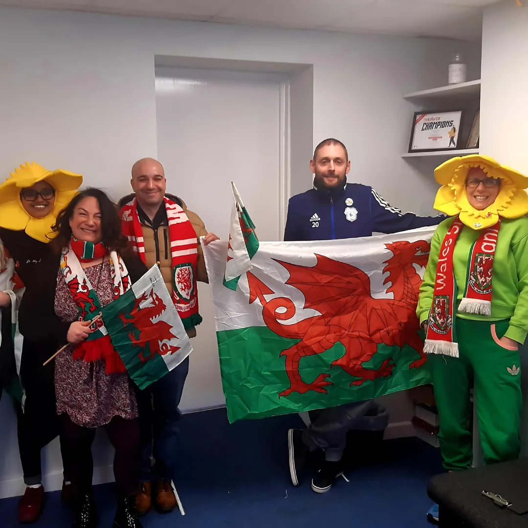 Recovery Cymru community members celebrating Wales and community connection.